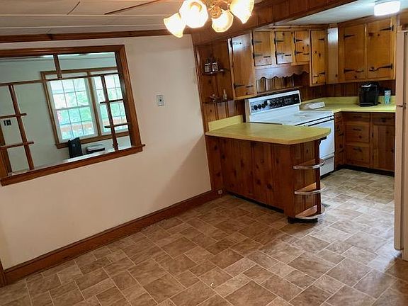 Kitchen/Dining Room Custom cabinetry to view living room