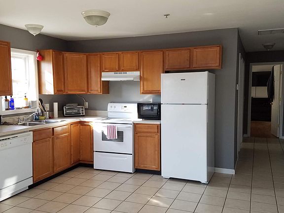 Looking at the kitchen from the bay windows.