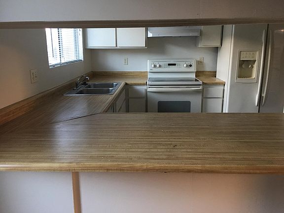 Kitchen with Refrigerator, Stove and Dishwasher