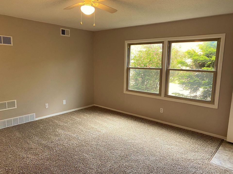 Spacious, bright living room with lovely new floors and heaps of streaming natural light!