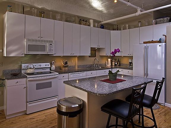 Large kitchen with island.  New washer & dryer in unit.