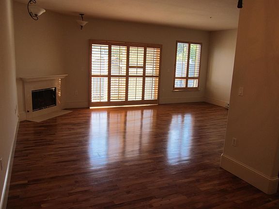 Living Room, balcony and fireplace