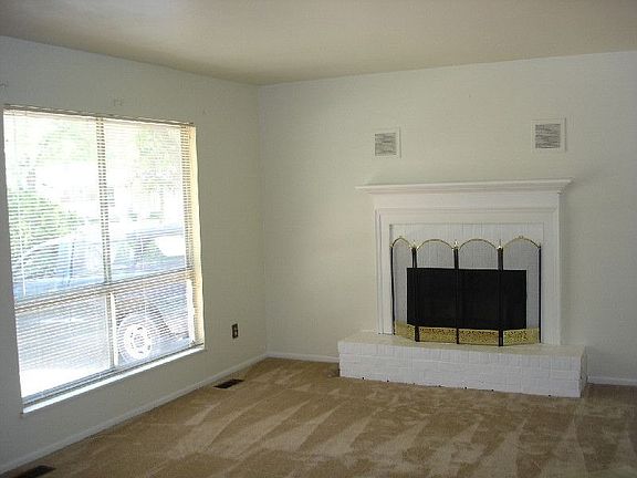 Wood burning fireplace in Living Room