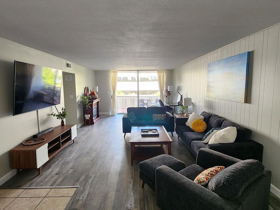 Living room from dining area (front door side)