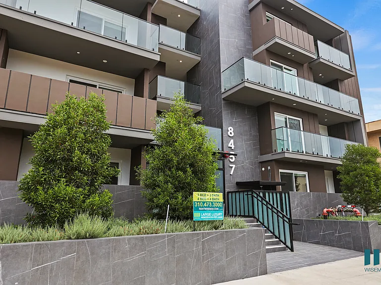 Sidewalk View of Blackburn La Cienega