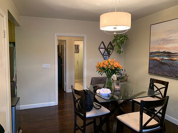 Dining room shown with smaller table seating but can fit larger sized too.