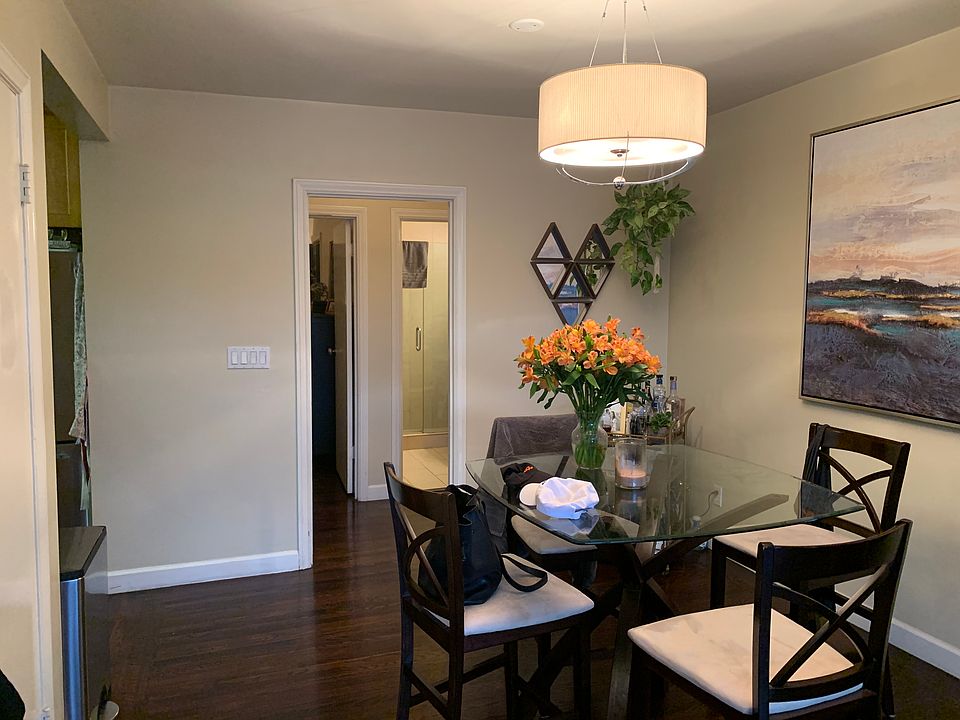Dining room shown with smaller table seating but can fit larger sized too.