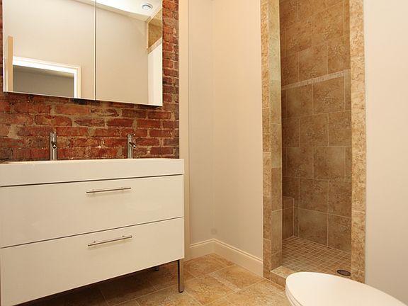 Second bath features luxurious shower