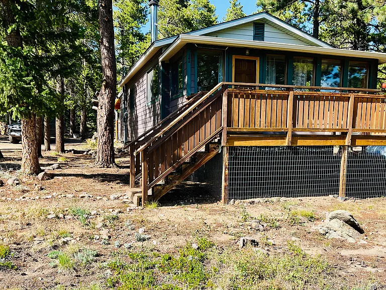 Front deck with fenced in bottom area for pets. (South facing)