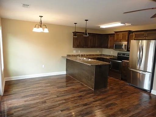 Your Dream Rental Home Awaits: Spacious 3BR/2.5BA in a Charming HOA Neighborhood! — Photo 2