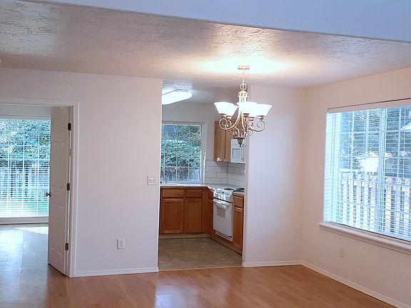Looking toward the dining room, kitchen and master bedroom.