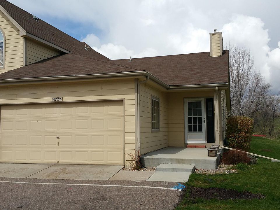 View of the property with the front porch and entryway.