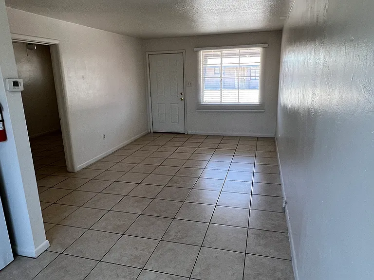 A view from the dining area to the living room.