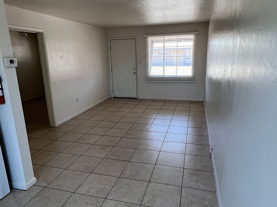 A view from the dining area to the living room.