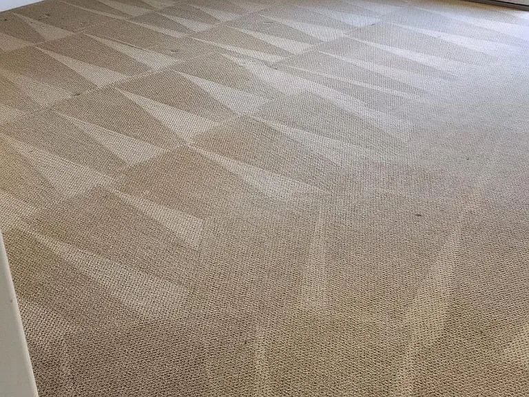 Entry into large primary bedroom.