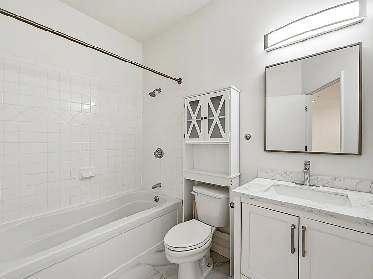 2422 Tremont Pl #103 — Photo 7