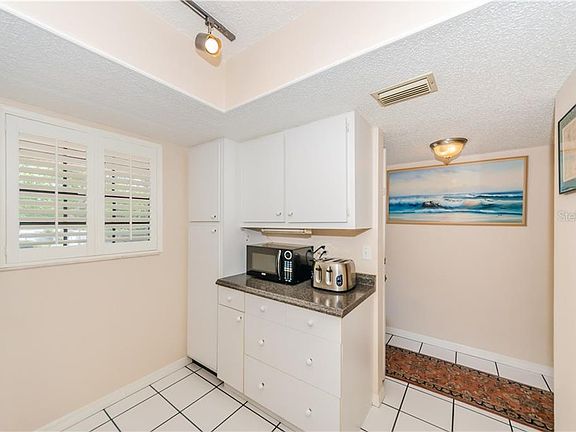 5th image of 1750 Belleair Forest Dr APT C14