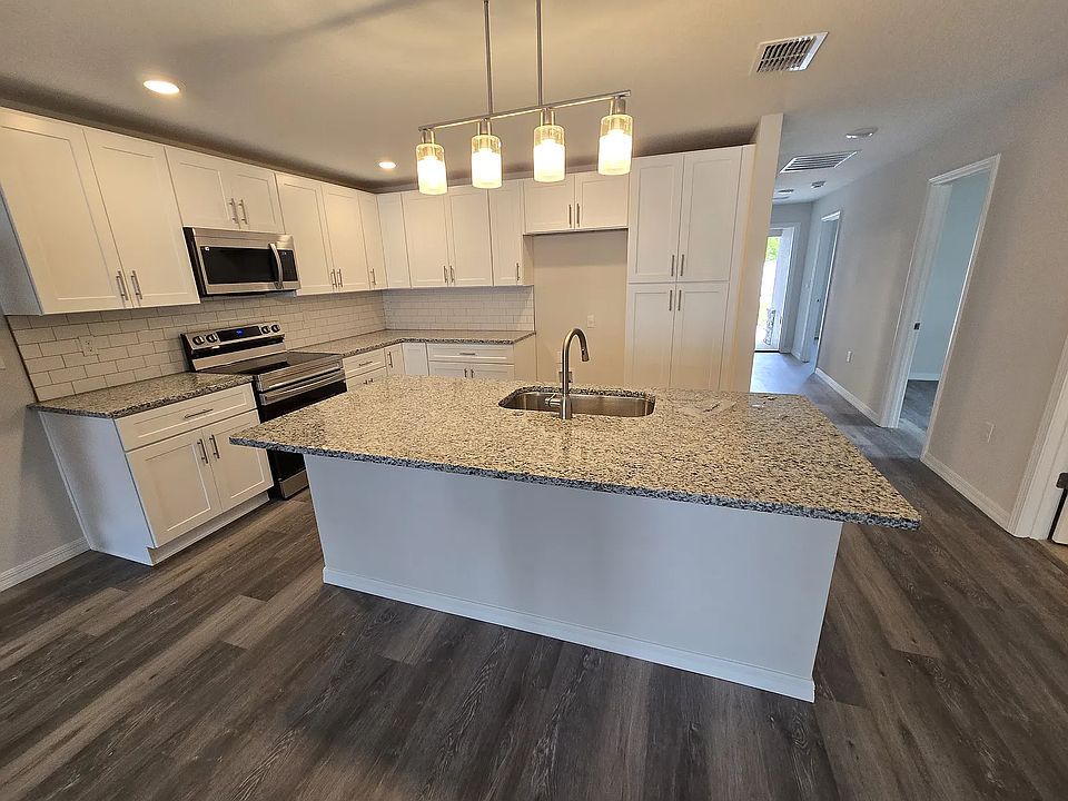 (there is a fridge in place, just not at the time of this photo)