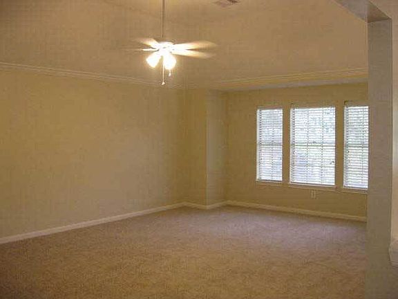 Game Room has room for both a pool table and big screen TV, vaulted ceiling