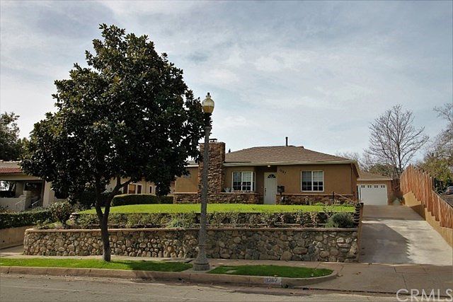 Perched above El Molino, this adorable home awaits its new owner.