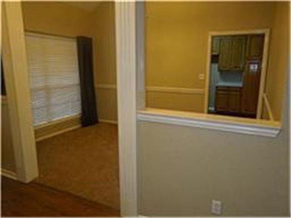 Formal dining could easily be used as office or study.