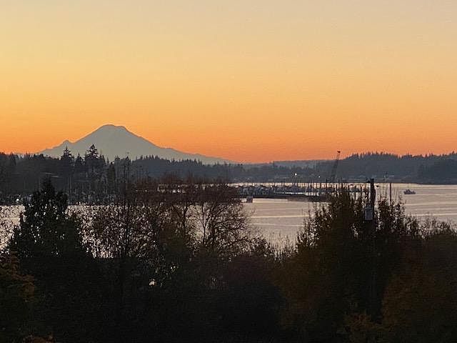 Watching gorgeous Mt Rainier and sunset off the deck