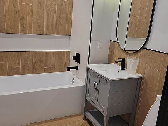 5th image of 1169 Hoe Ave APT 2D