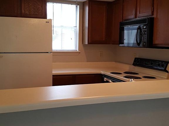 5th image of 1103 W 101st Ter APT A