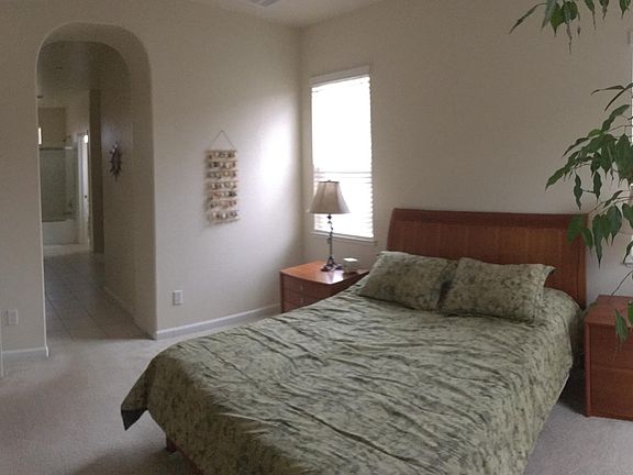 Master bedroom into bathroom