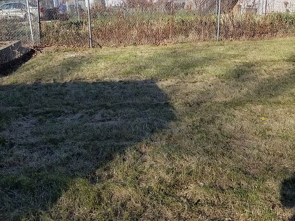 Adjacent lot included in the sale, separate PIN # 20173050330000