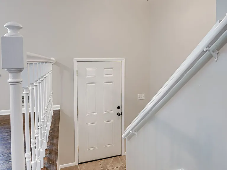 Split entry
Up: 3 bedrooms, 2 full bathrooms, living room, kitchen/dining, and sliding glass door to fenced back yard
Down: 2 additional bedrooms (1 non-conforming), 1 full bath, garage access, and laundry