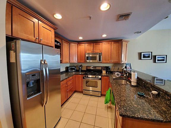 Updated Kitchen with full size stainless steel appliances and granite countertops