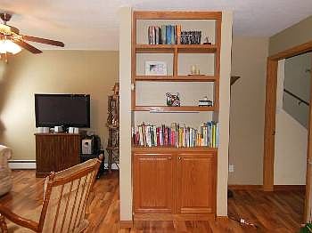 This built in bookcase is very handy and attractive.