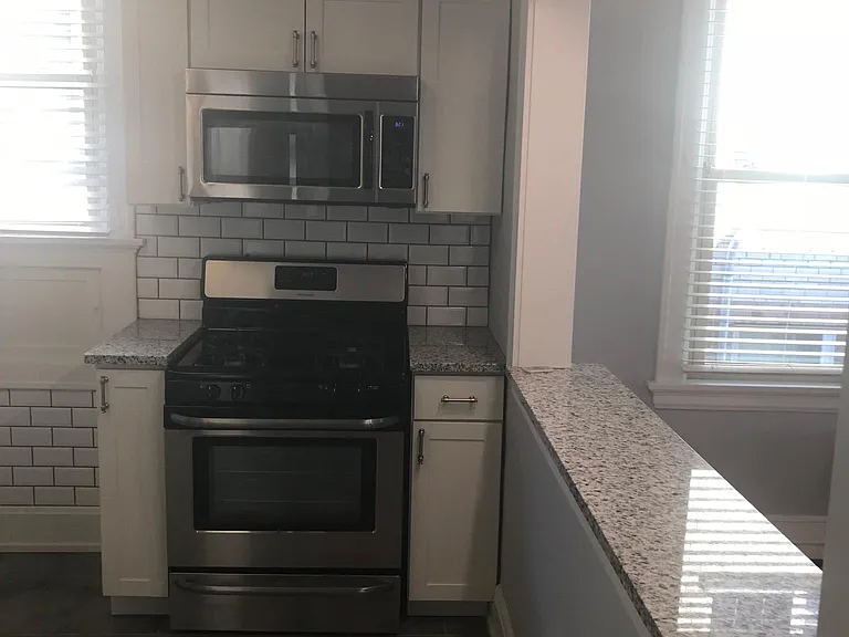 Kitchen on left, bar on right
