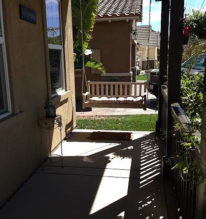 front porch with swing