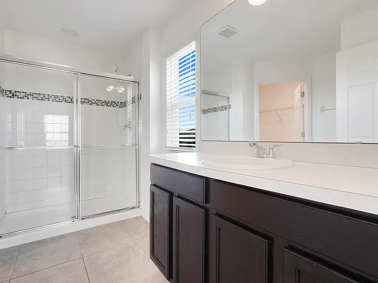 en-suite bathroom - second primary - second floor