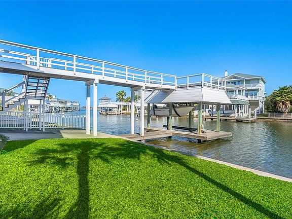 Rear staircase leads to catwalk and deck