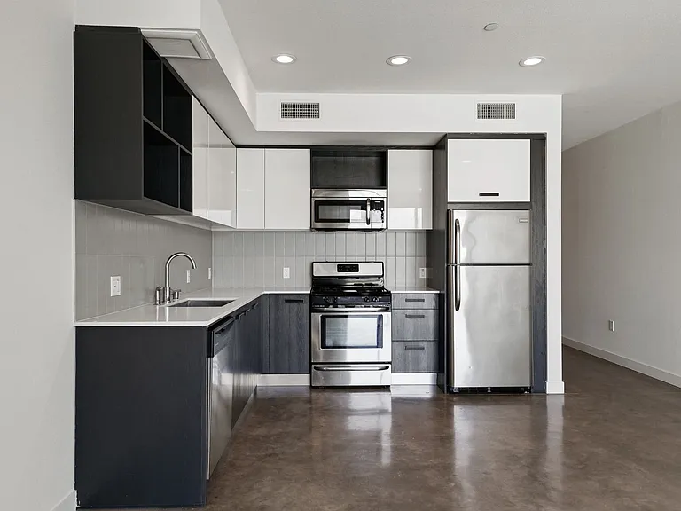 Kitchen with Stainless-Steel Appliances and Cabinet Storage