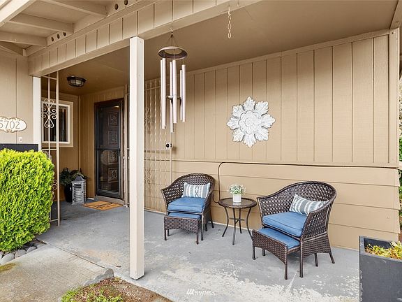 Breezeway style entry with covered front porch to greet your guests.