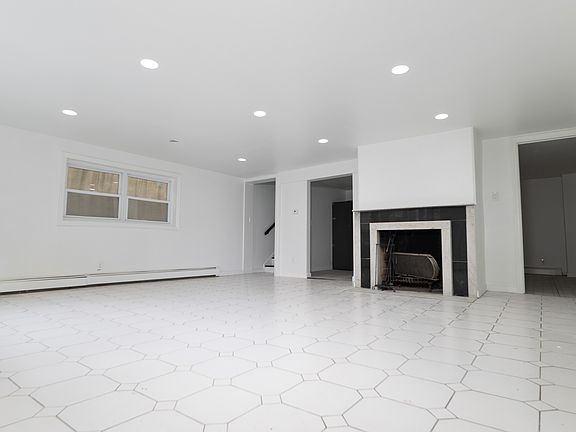 Large living room with plenty of light.