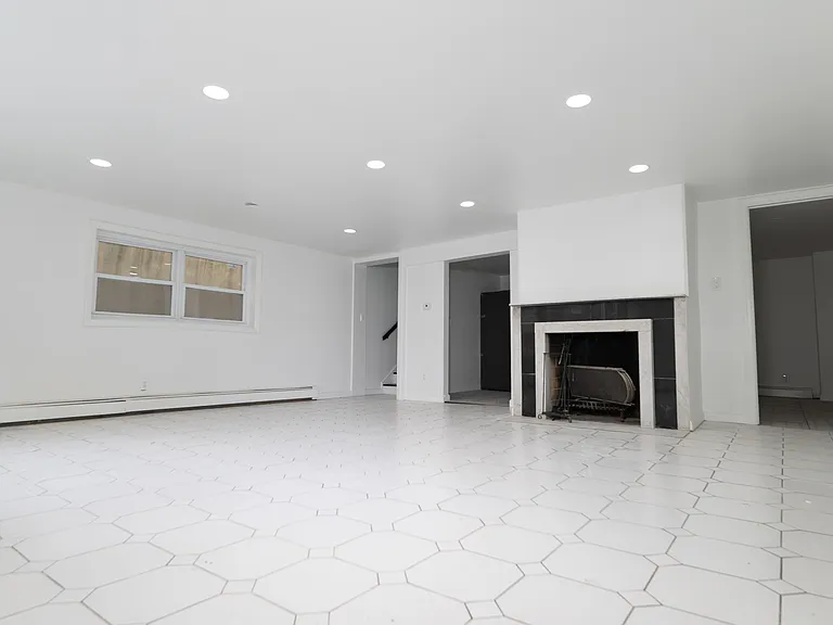 Large living room with plenty of light.