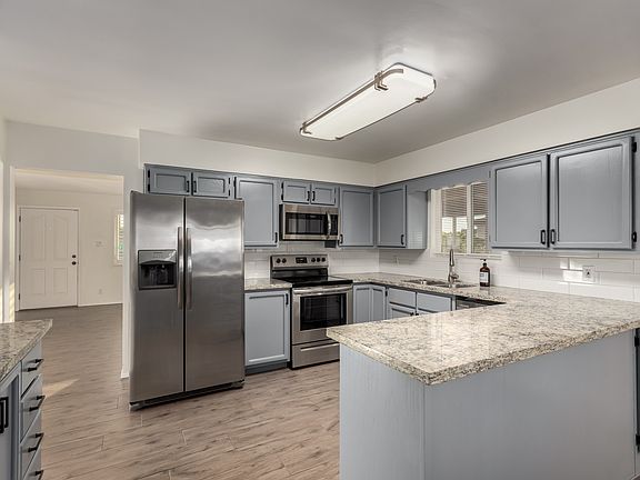 Stainless steel appliances, granite counters,and plenty of storage.