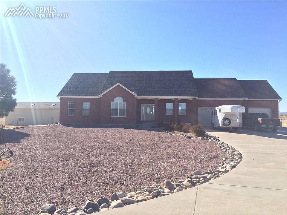 Wonderful 4500 sf house on 35 acres with shop, barn and 3-car garage.