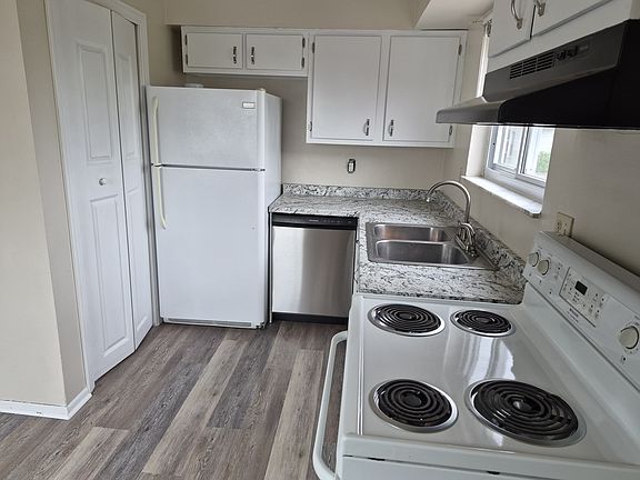 New flooring, countertops, and dishwasher.
