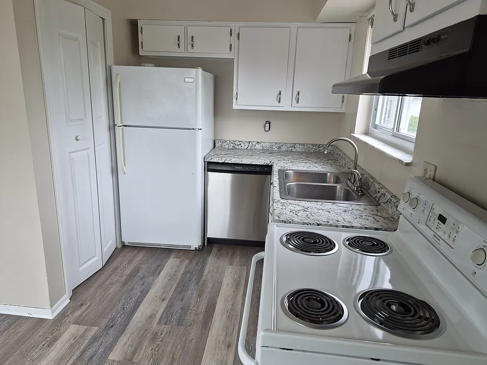 New flooring, countertops, and dishwasher.