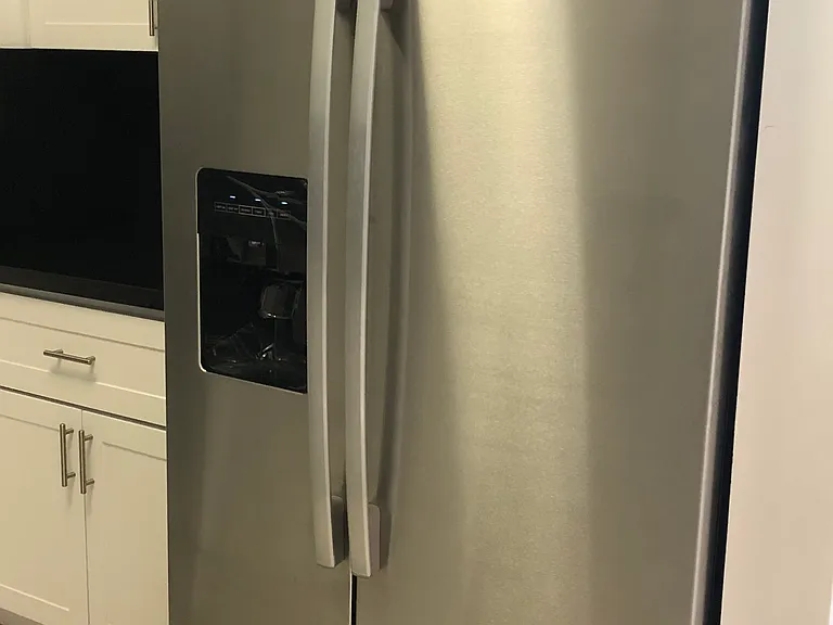 Refrigerator with water & ice dispenser