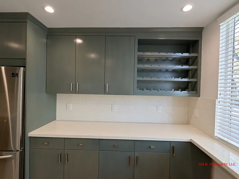 Kitchen Comes with High-End Finishes including Wine Rack