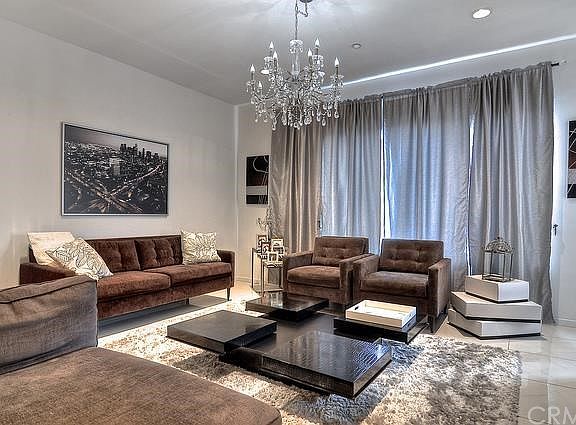 Enjoy an Extravagant Entertainer's Great Room complimented by a sleek and Romantic Formal Dining Area!