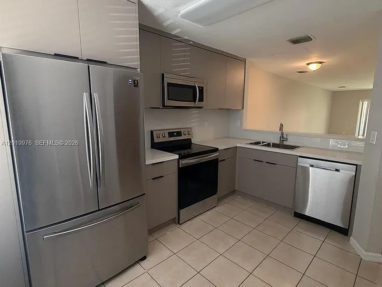 3023 SW 129th Ter #155 — Photo 6