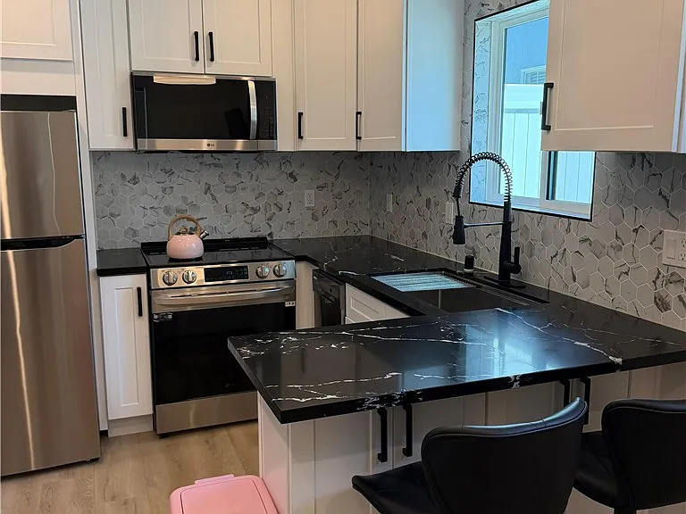 7044 Teesdale Ave — Photo 1